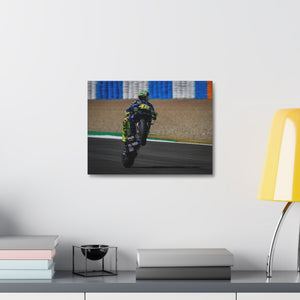 Valentino Rossi popping a wheelie in style