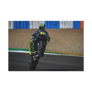 Valentino Rossi popping a wheelie in style