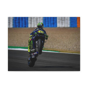 Valentino Rossi popping a wheelie in style