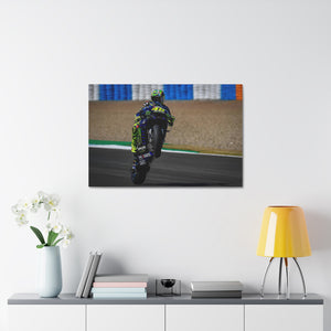 Valentino Rossi popping a wheelie in style