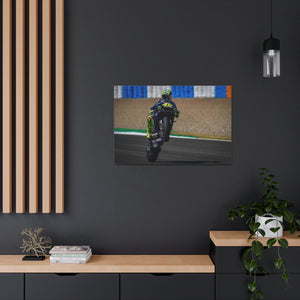 Valentino Rossi popping a wheelie in style