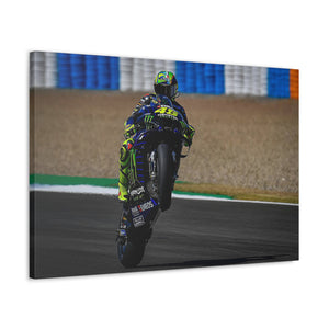 Valentino Rossi popping a wheelie in style