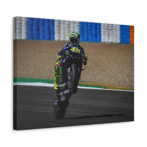 Valentino Rossi popping a wheelie in style